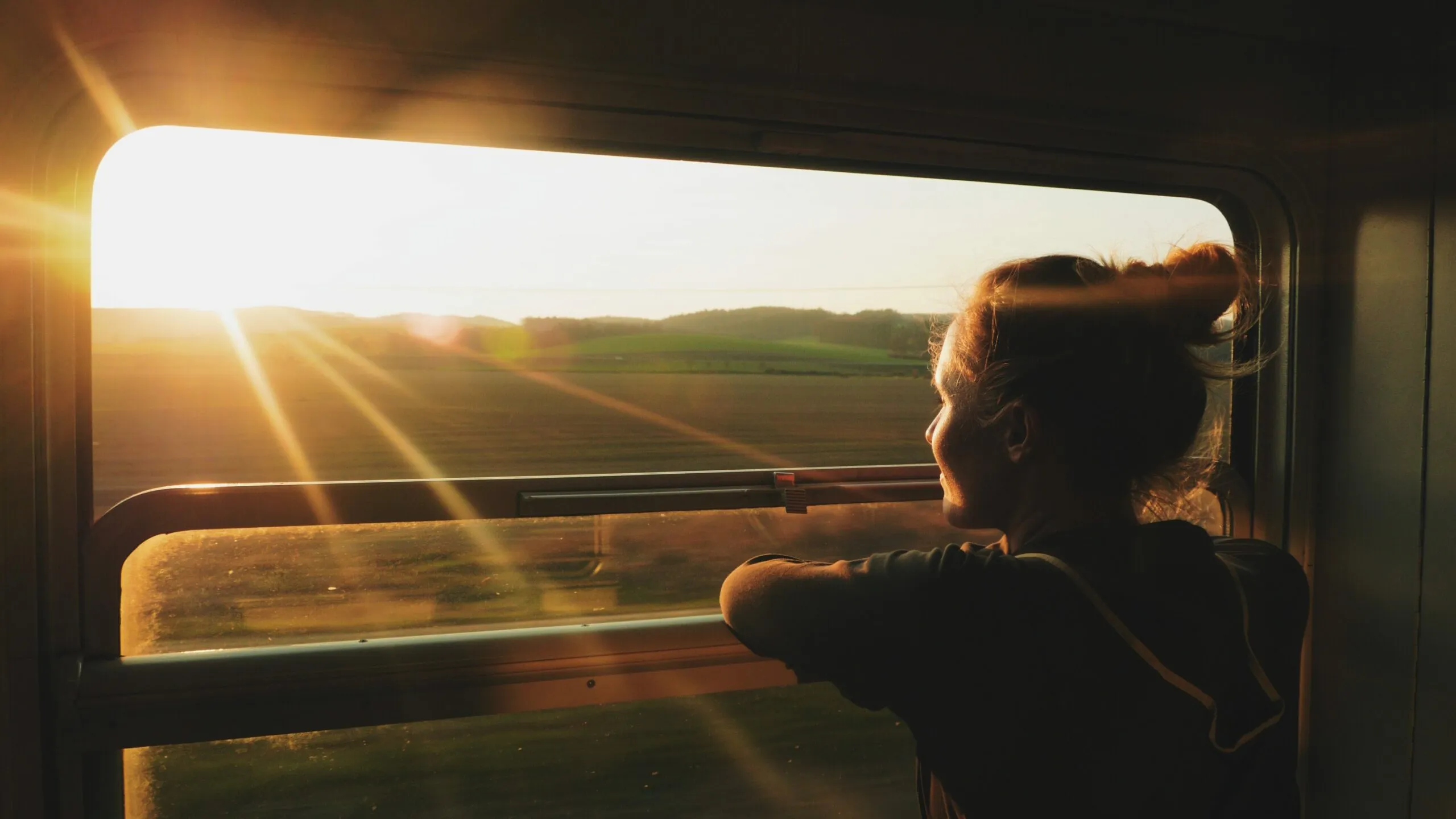 caucasian woman traveling by train